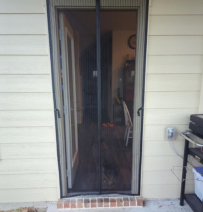 Retractable screen door installed as an outdoor upgrade to enhance backyard comfort and make it a summer hotspot.