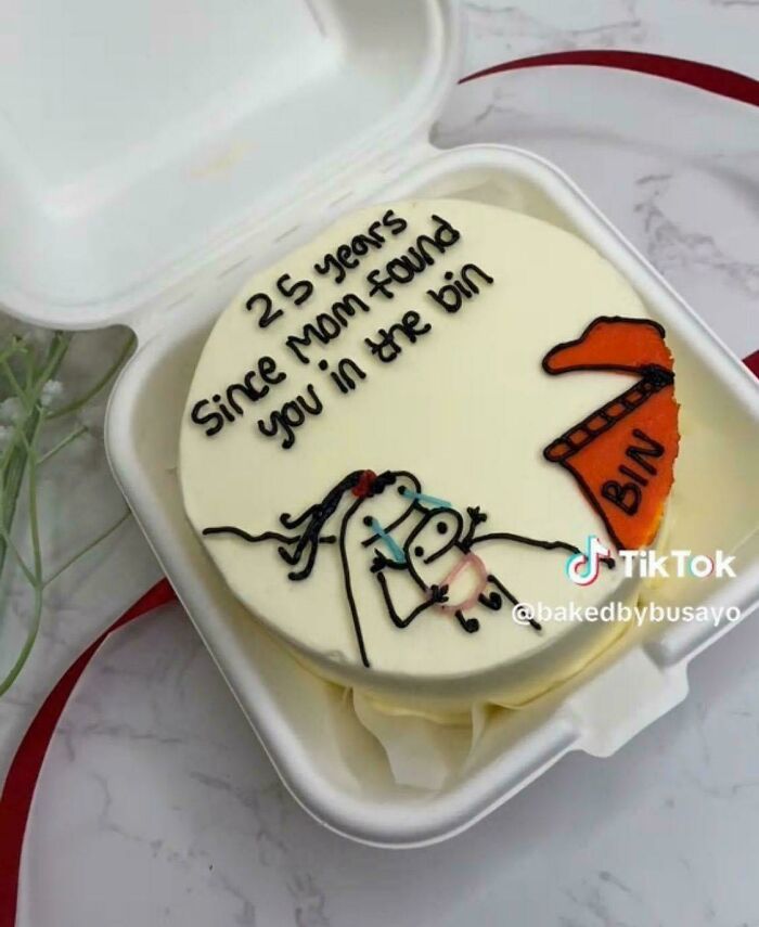 Cake with cartoon and text, a blursed image likely to make your brain short-circuit with its unusual humor.