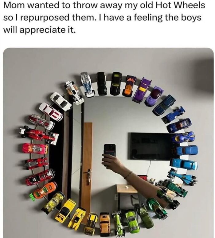 Mirror decorated with colorful Hot Wheels toy cars arranged in a circle, showcasing hilarious nonsense in random memes.