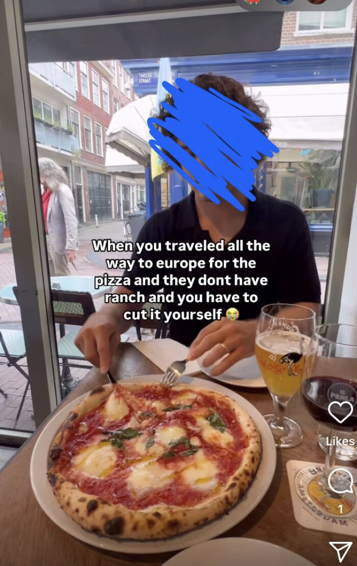 Customer at a European restaurant cutting pizza themselves, illustrating entitled customers leaving absurd reviews.