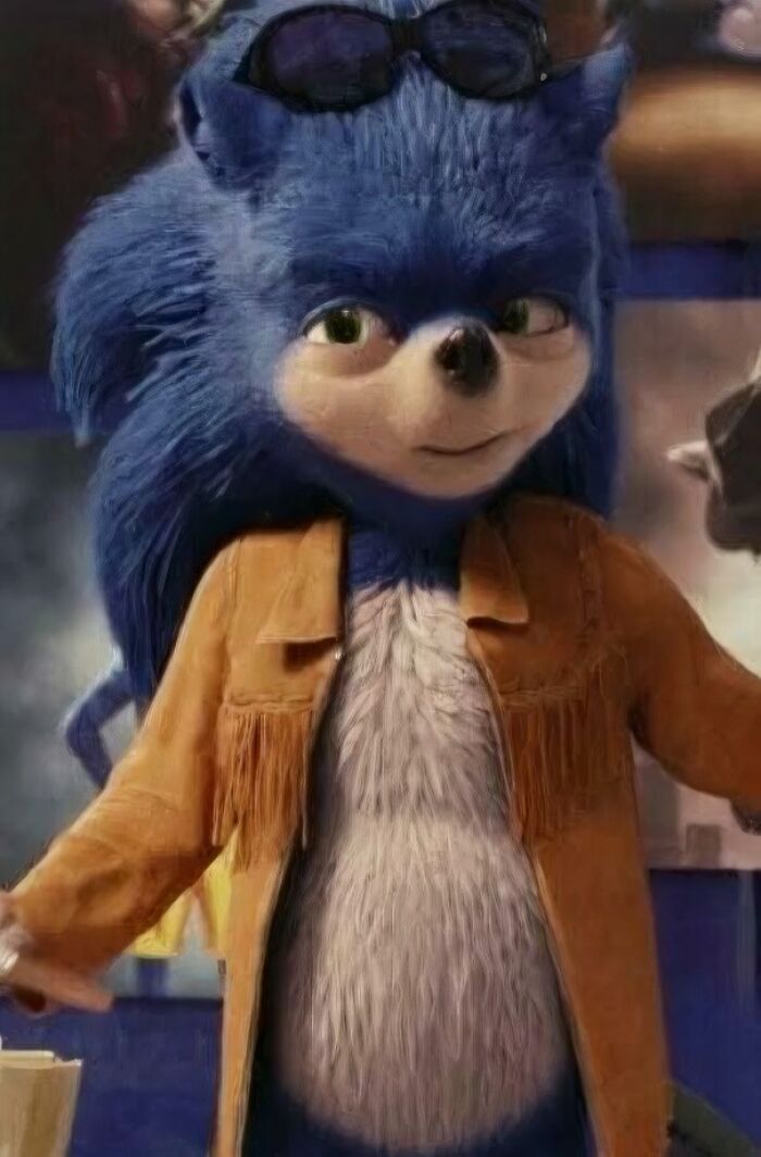 Unusual movie character with blue fur and a brown fringed jacket, highlighting questionable movie details mocked by cinephiles online.