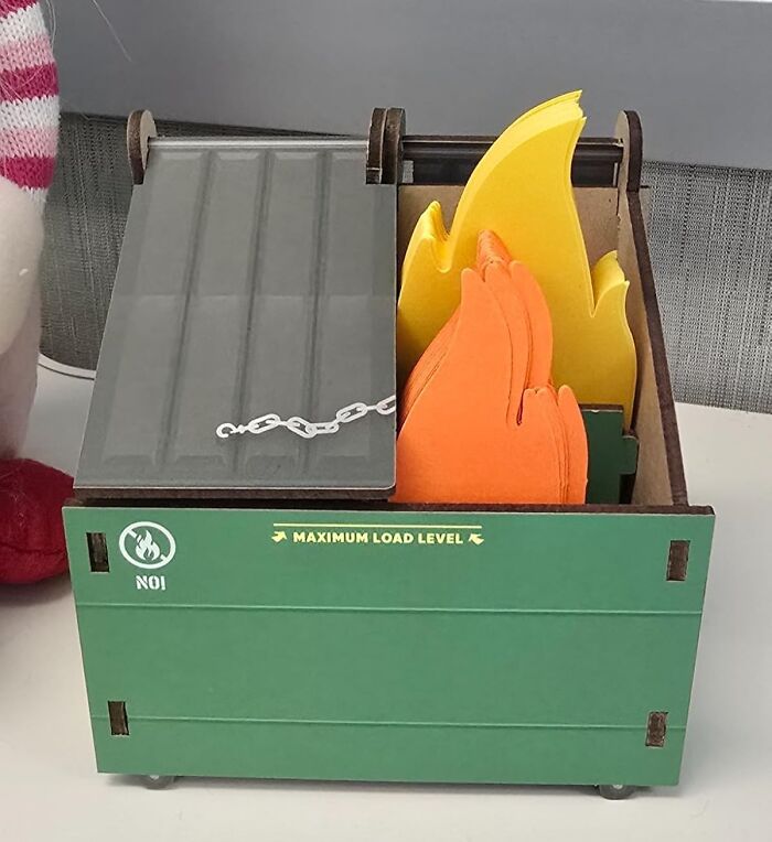 Green desktop organizer with flame-shaped and orange paper cutouts to brighten your desk, making it a Monday happy place.