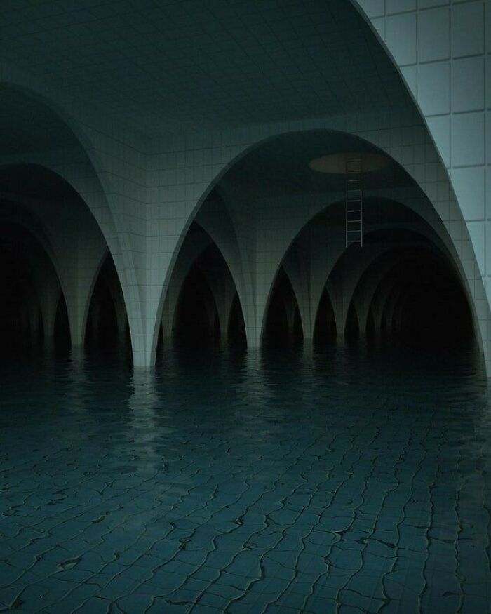 Dark empty space with arched structures partially submerged in water, evoking unsettling yet fascinating empty spaces.