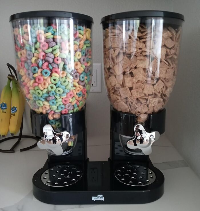 Dual cereal dispenser with colorful and bran cereals on kitchen counter, a perfect hack for becoming a morning person.
