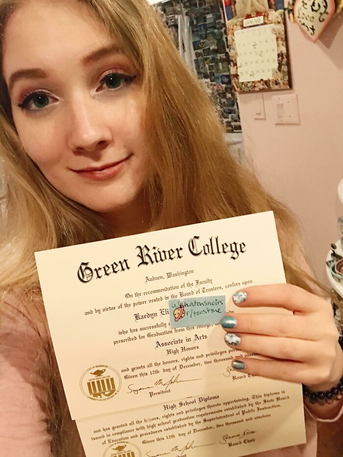 Young woman proudly holding college diploma, sharing her achievement and receiving supportive internet toast comments.