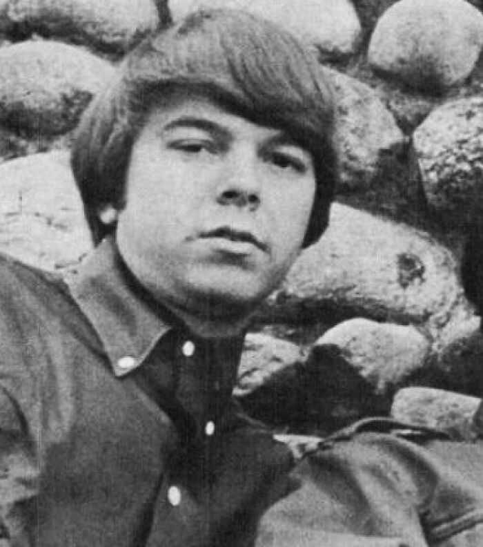 Black and white portrait of a young man with medium-length hair, representing notable people who passed away in 2025.