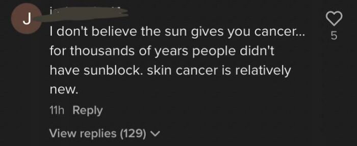 Screenshot of a social media comment denying sun causes cancer, showing flawed thinking in the bacteria don't exist discussion.