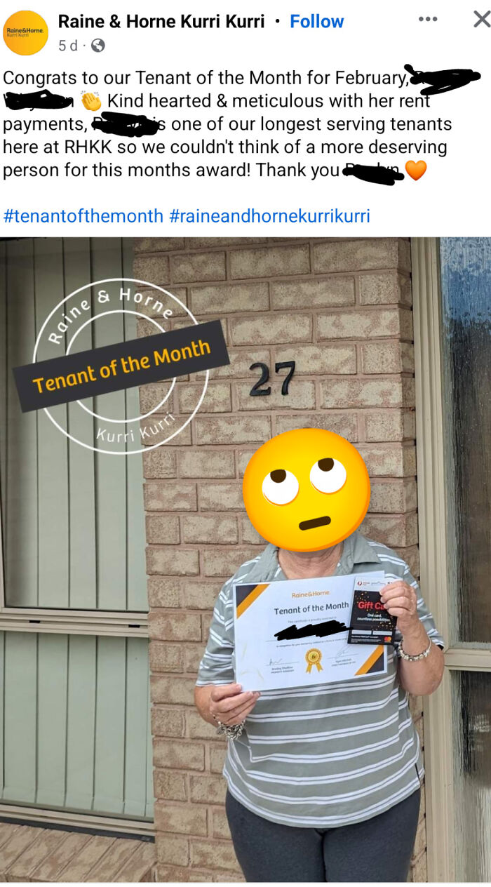 Person holding tenant of the month certificate outside a rental property, highlighting landlord and tenant relations.
