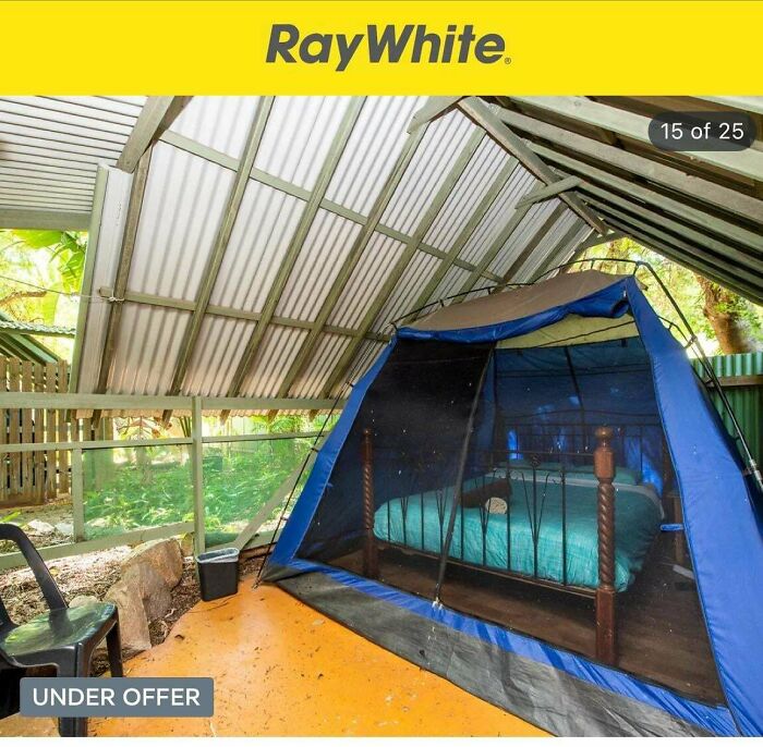 Outdoor shelter with a tent enclosing a bed, illustrating bad landlords creating difficult renting situations.