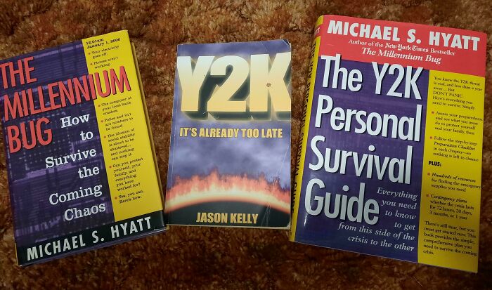 Three vintage Y2K survival guide books on a carpet, showcasing things that aged so bad they went sour.