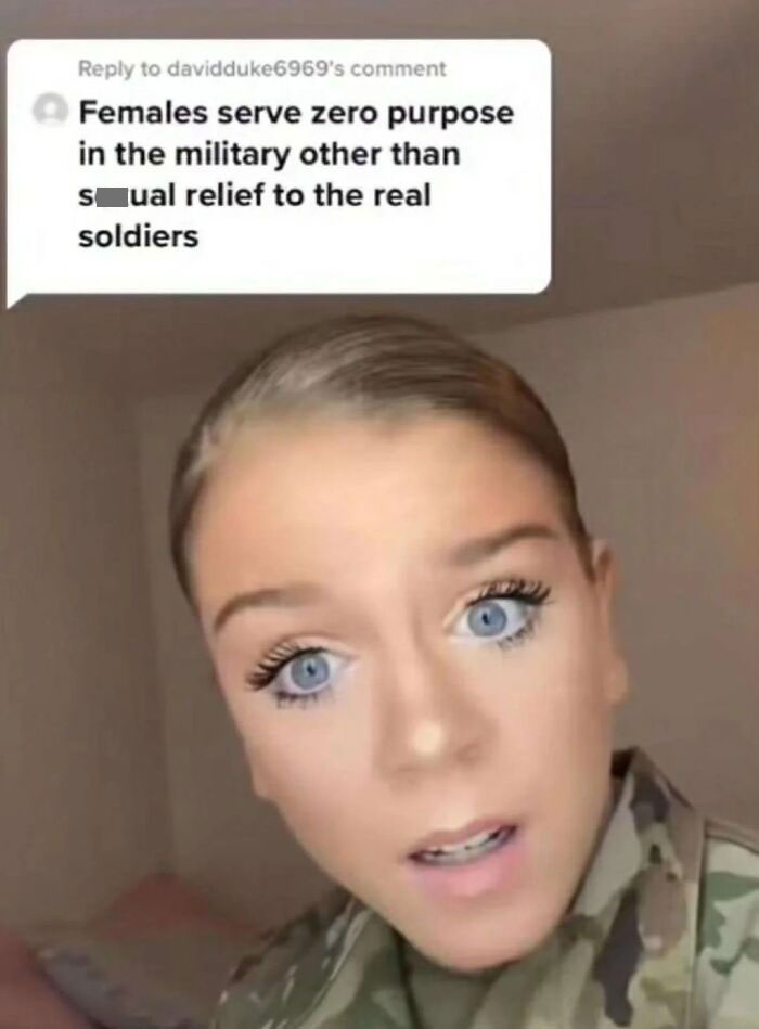 Young woman in military uniform reacting to a sexist comment about women's purpose in the military.