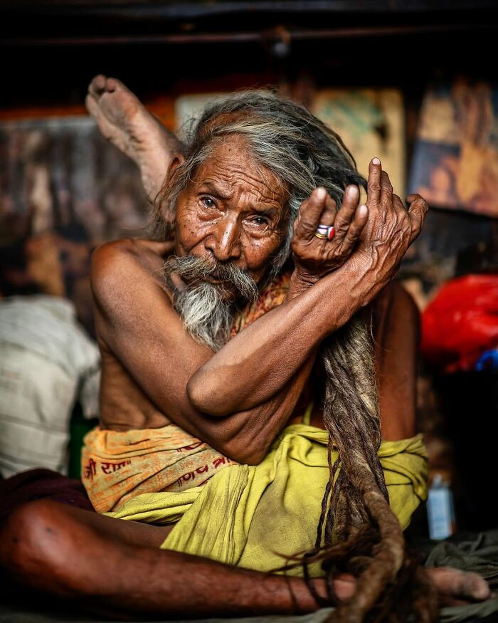 Elderly man with long dreadlocks and weathered face in a powerful striking portrait of elderly people across the globe.
