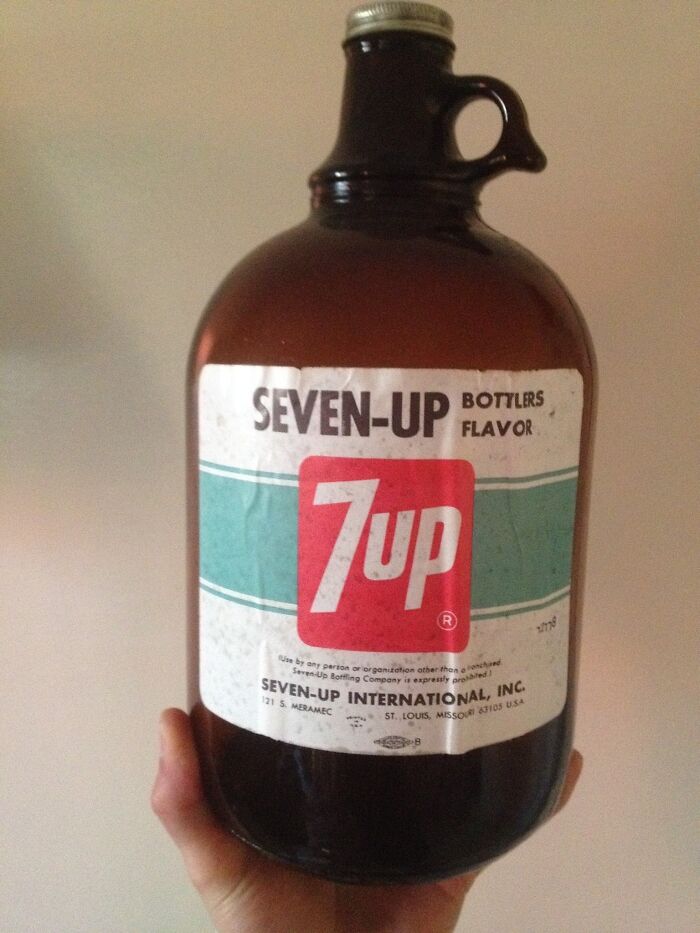Vintage brown glass bottle of Seven-Up with old label, a bizarre thing found in old houses that left everyone confused.