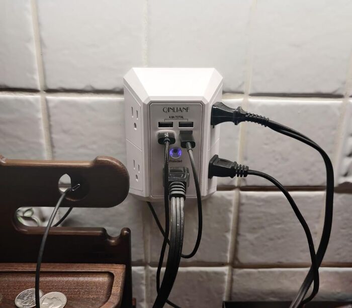 Compact internet gold product power strip on Amazon with multiple USB and outlet ports in home setting.