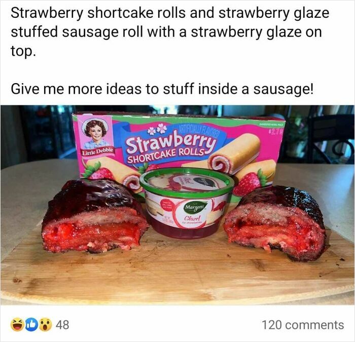 Strawberry shortcake rolls and strawberry glaze stuffed inside a sausage roll on a wooden cutting board, cursed food pic.
