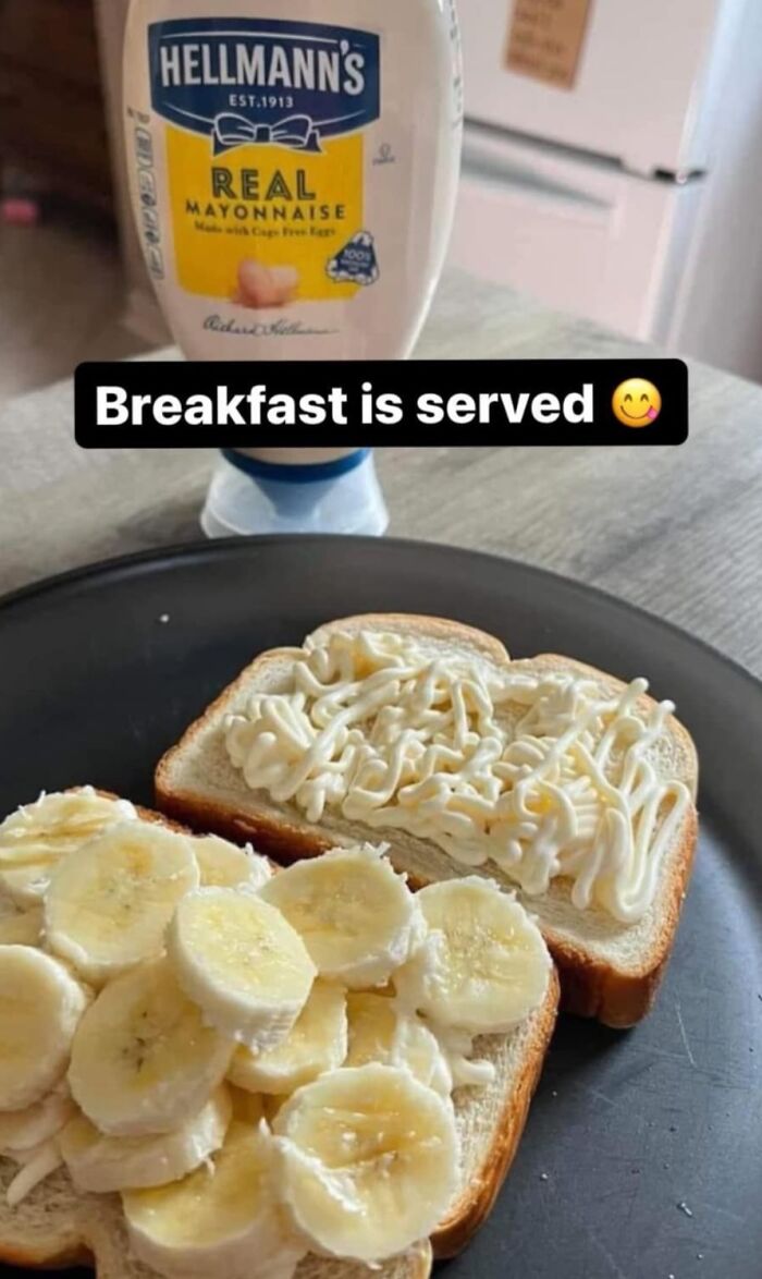 Sandwich with banana slices and mayonnaise spread on white bread, an example of cursed food pics.
