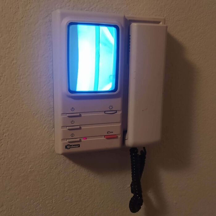 Vintage video intercom device mounted on a wall, showcasing classic technology and vintage devices innovation.