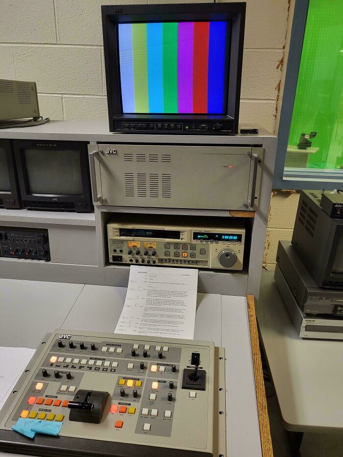 Vintage video and audio equipment setup with monitors and control panel showcasing vintage devices technology.