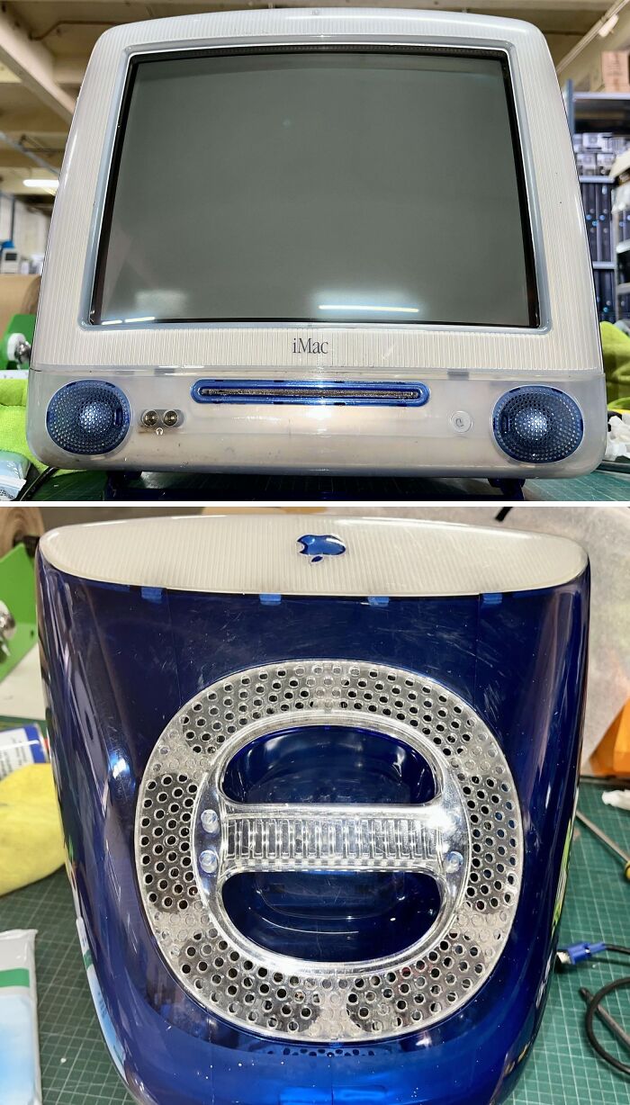 Vintage iMac computer with translucent blue casing and built-in speakers, showcasing classic vintage devices technology.