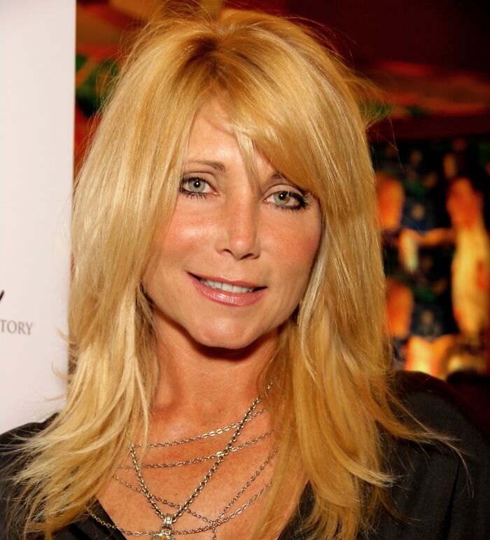 Blonde woman with layered hair and light makeup at an event, representing notable people who passed away in 2025.