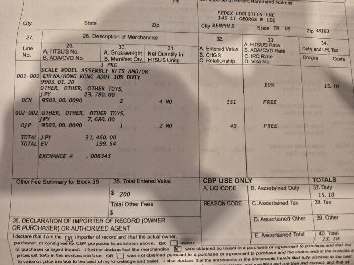 Receipt showing import details of toys with tariff charges, illustrating the impact of high tariffs on regular Americans.
