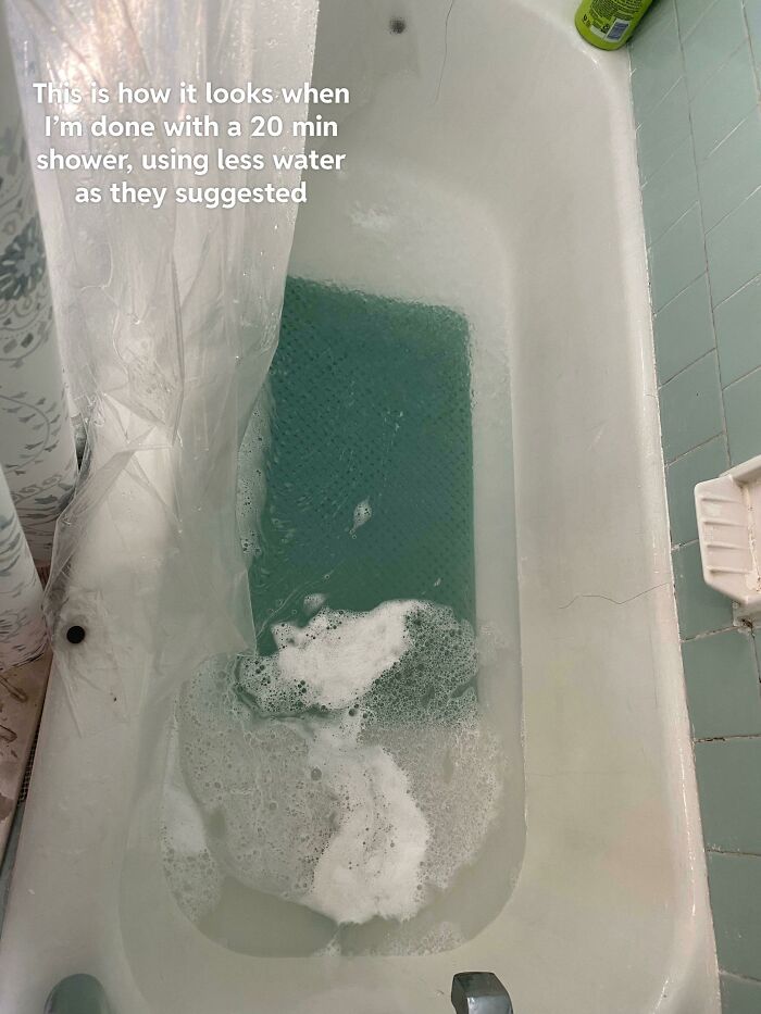 Bathtub filled with dirty water after a 20-minute shower, an example of infuriating landlord’s landlord specials causing renter frustration.