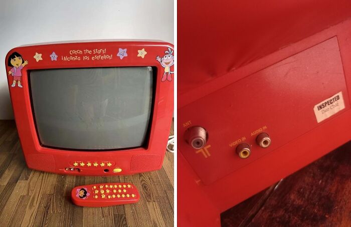 Vintage red children's TV with Dora the Explorer theme and remote, showcasing vintage devices reflecting technology progress.