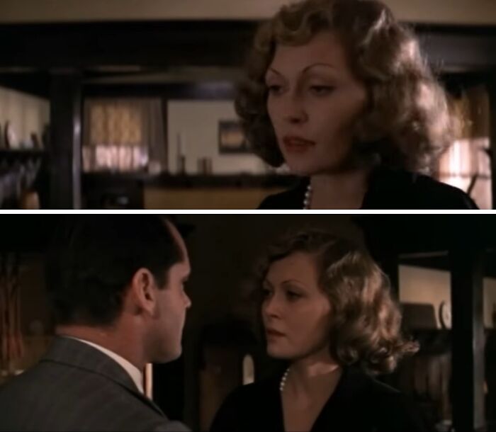 Two actors in a tense scene during a behind-the-scenes moment from movies and TV production.