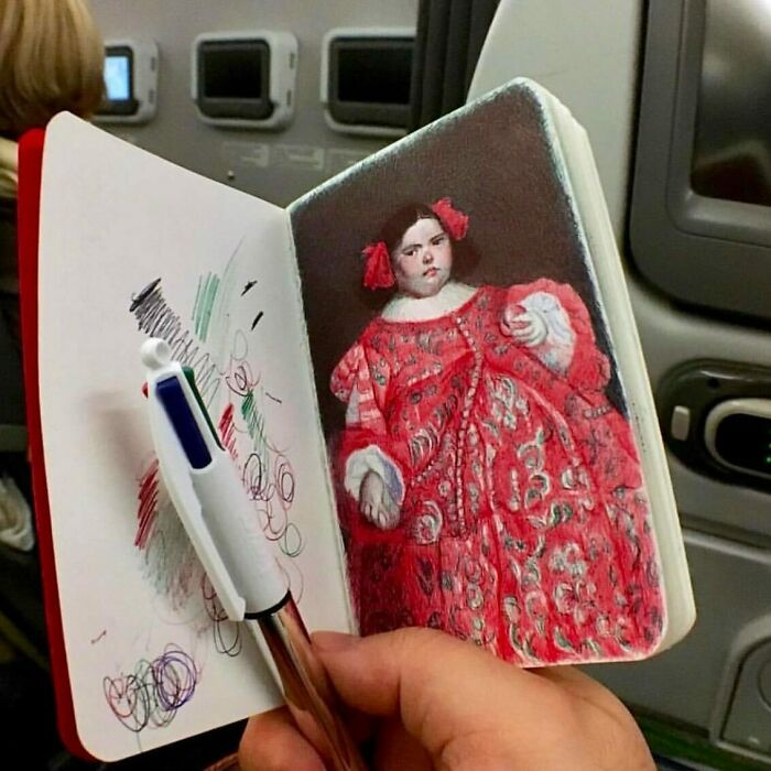 Tiny sketchbook held open to show detailed drawing of a woman in a red dress, capturing big emotions in everyday moments.