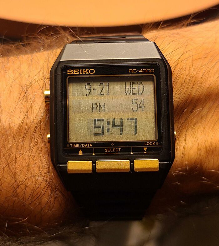 Vintage Seiko digital watch with data display and gold buttons, showcasing retro technology in vintage devices collection.