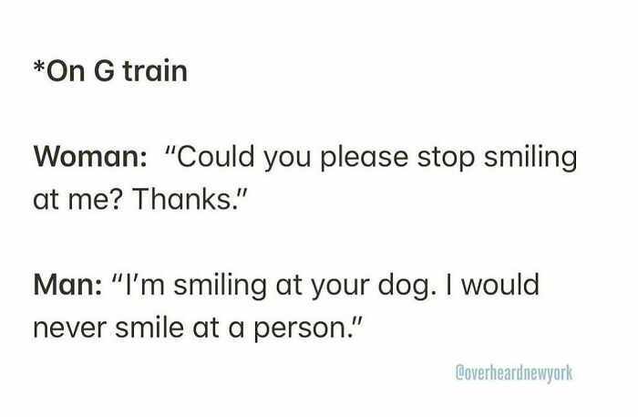 Conversation overheard on G train where a man says he smiles at a dog but never at a person in New York City.