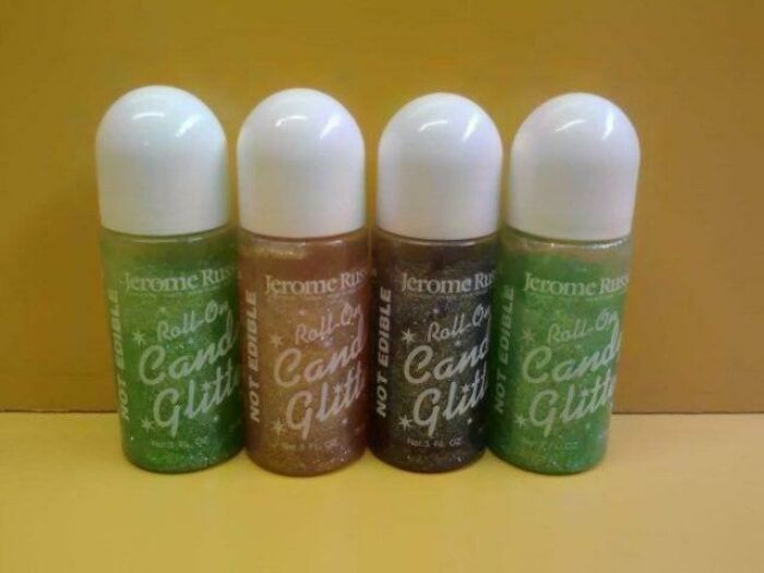 Four vintage glitter roll-on bottles, popular accessories in cringey nineties fashion trends left behind.