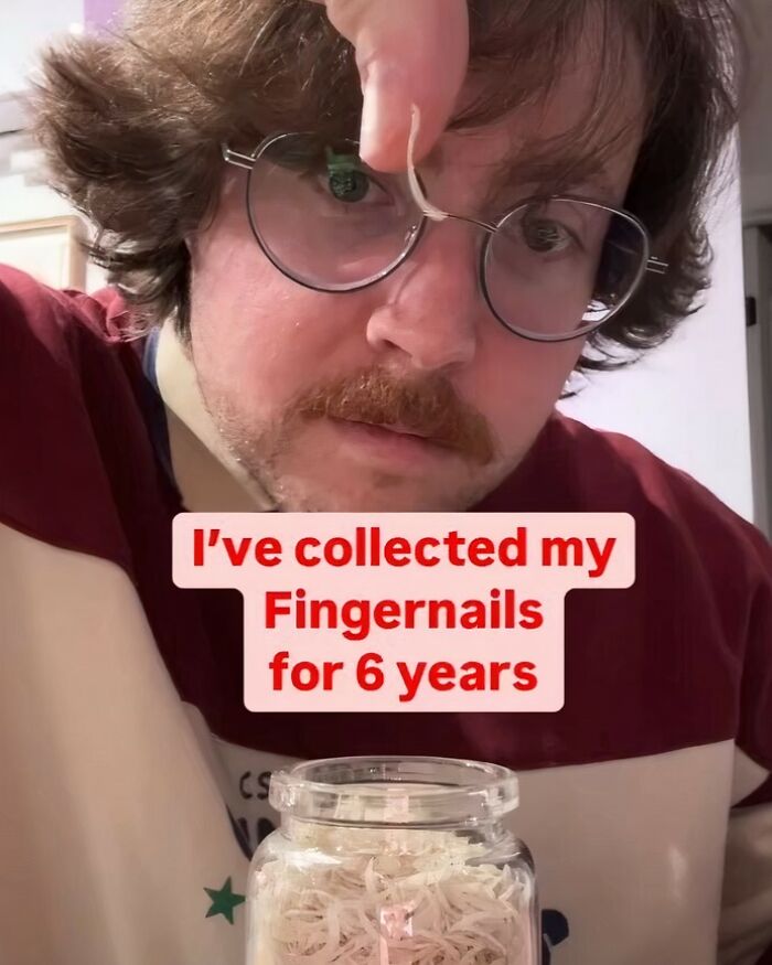 Man with glasses holding long fingernail piece above jar filled with collected fingernails cringey Instagram pictures.