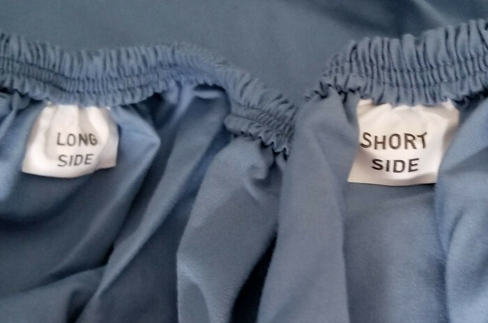 Labels inside blue fabric indicating long side and short side, showcasing clever problem solving for overlooked issues.