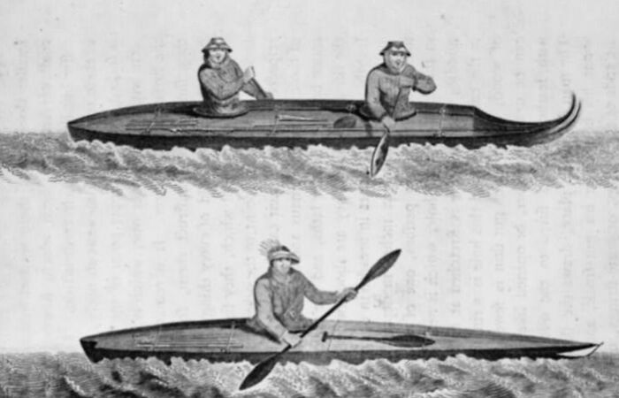 Two men paddling vintage wooden boats on choppy water, depicting historic commutes in a bygone working world.