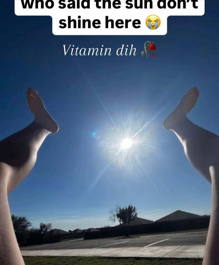 Legs raised toward the bright sun in a clear sky, showcasing a cringey Instagram moment about vitamin D.