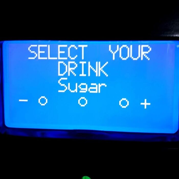 Blue screen on a technology device displaying a drink selection menu, illustrating technology disasters and user interface errors.