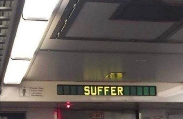 Train digital display showing the incorrect word suffer, illustrating a technology disaster and system error.