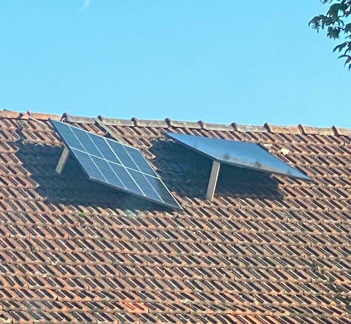 Solar panels installed incorrectly on a tiled roof, illustrating infuriating landlords and their landlord specials causing renter frustration.