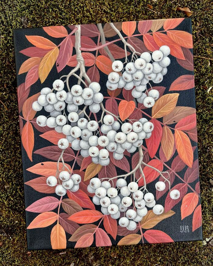 Nature-inspired painting of white berries and autumn leaves in shades of orange and red by Vasilisa Romanenko