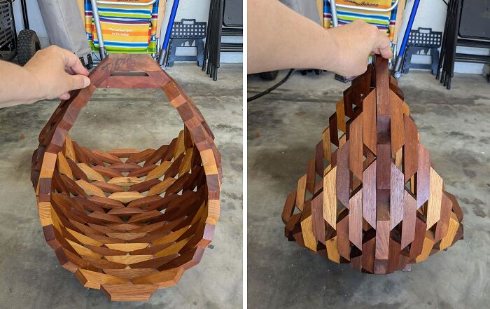 Hand holding a geometric wooden basket showcasing mid-century designs with vintage charm on a concrete floor.