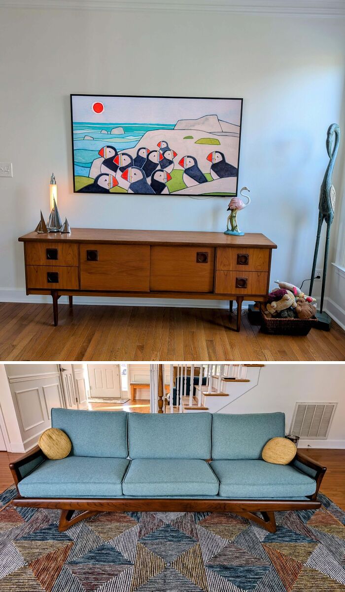 Mid-century designs featuring a wooden sideboard and a blue couch with vintage charm in a living room setting.