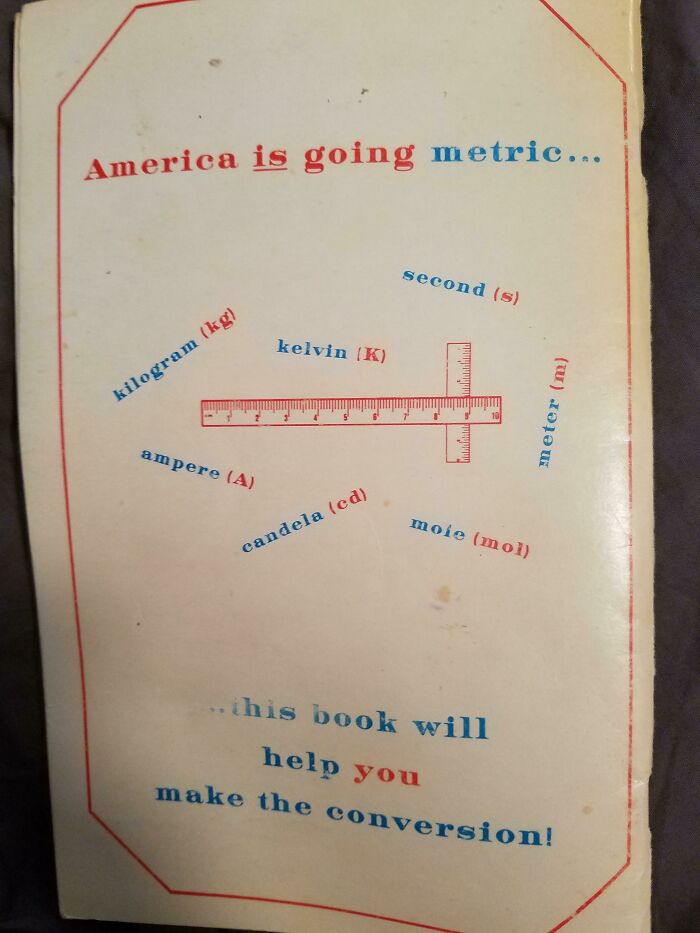 Old book cover humorously promoting American metric conversion with colorful text and a red ruler illustration facepalm-worthy screenshot.
