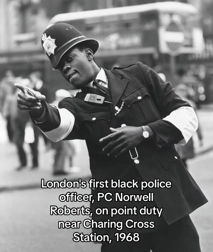 Black police officer on point duty in London near Charing Cross Station, a monumental life moment frozen in time, 1968.