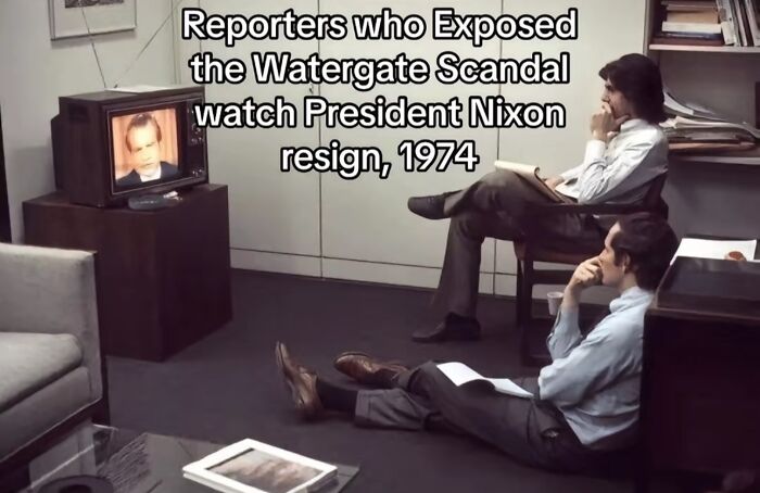 Reporters watching President Nixon resign in 1974, a monumental life moment frozen in history.