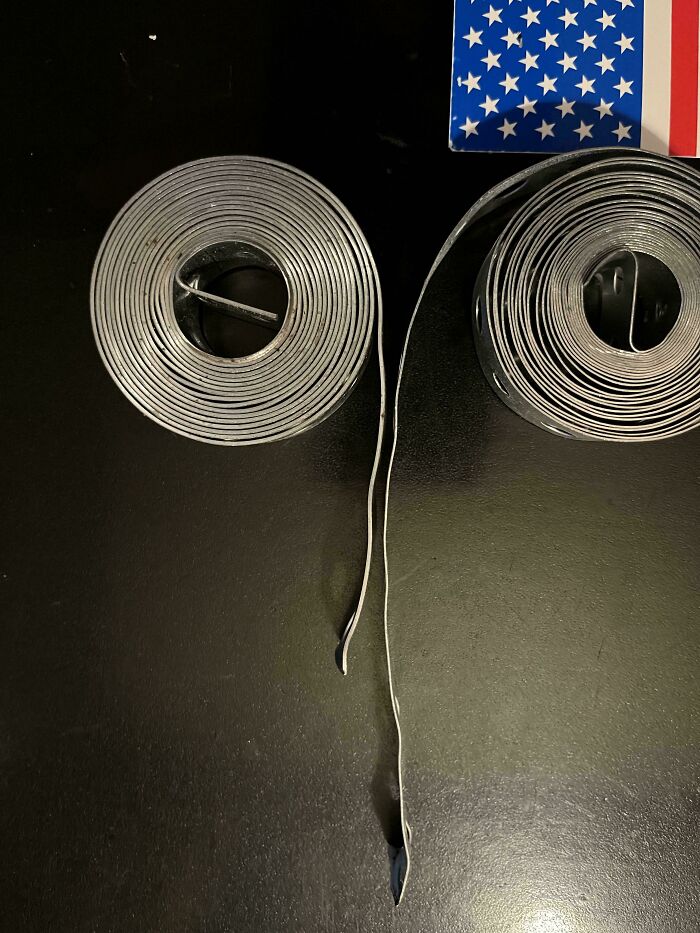 Two rolls of tape with one significantly smaller than the other, illustrating products getting smaller and more expensive.