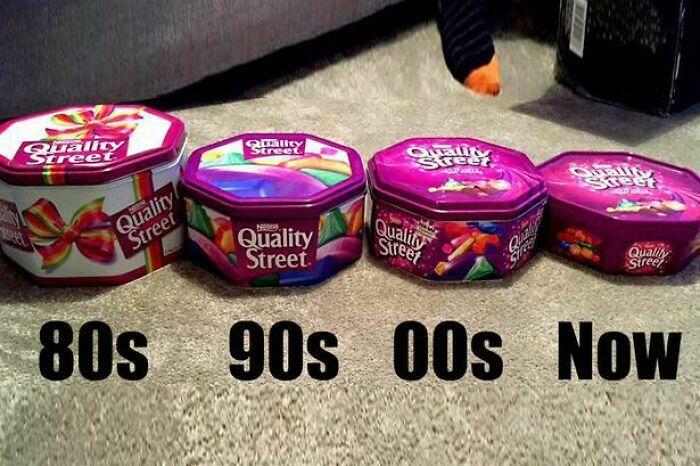 Four Quality Street tins from the 80s to now showing products getting smaller and more expensive over time.