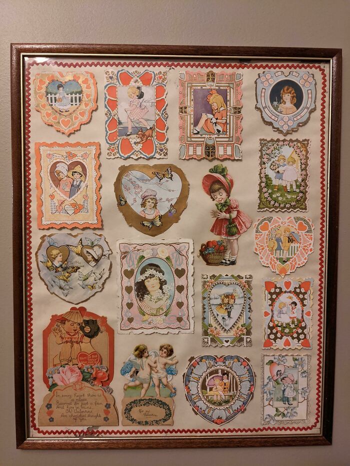Framed collection of vintage Valentine cards with illustrations, showcasing how things used to look in past eras.