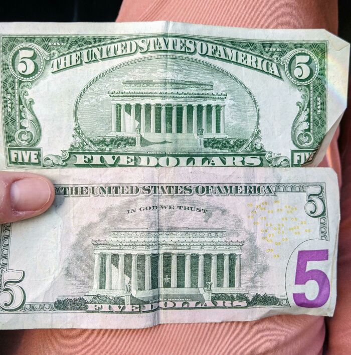 Two five-dollar bills showing how things used to look with differences in design and wear on a pink background.