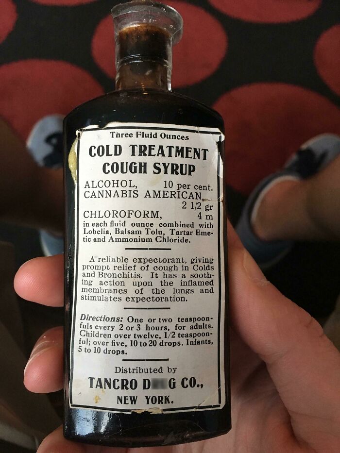 Vintage cold treatment cough syrup bottle with cannabis and chloroform, showing how things used to look in medicine packaging.